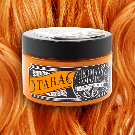 Hermans Hårfarve Tara Tangerine (115 ml) fremvises mod levende orange hår, med en vintage-stil etiket, der fremhæver dens semi-permanente, veganske hårfarve formel og grusomhedsfri skønhedsløfte.